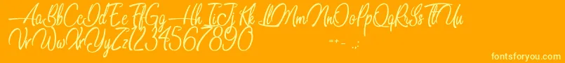 Dancing in the Beat Font – Yellow Fonts on Orange Background