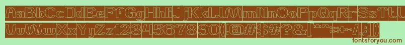DANIEL Hollow Inverse-fontti – ruskeat fontit vihreällä taustalla