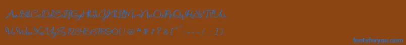 Fonte daniella script – fontes azuis em um fundo marrom