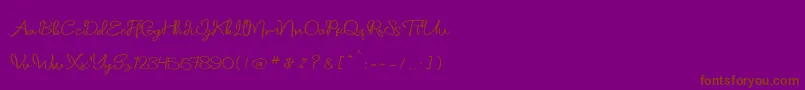 daniella script-Schriftart – Braune Schriften auf violettem Hintergrund