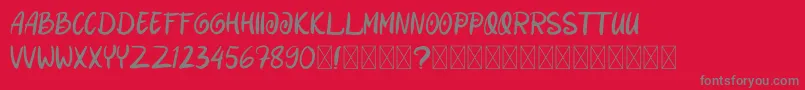 DanishaRomance-Schriftart – Graue Schriften auf rotem Hintergrund