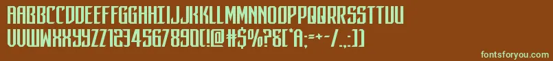 フォントdarkdominionexpand – 緑色の文字が茶色の背景にあります。