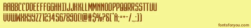 フォントdarkdominionlaser – 茶色の文字が黄色の背景にあります。