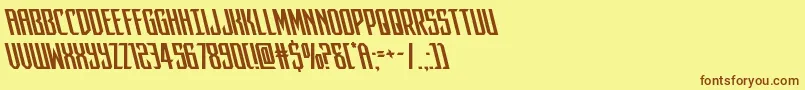 フォントdarkdominionleft – 茶色の文字が黄色の背景にあります。