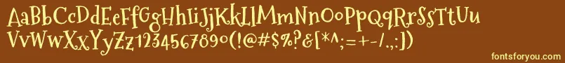 MountainsofchristmasBold Font – Yellow Fonts on Brown Background