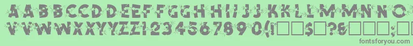 フォントSpencerRegular – 緑の背景に灰色の文字