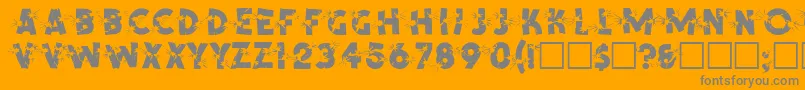 SpencerRegular-fontti – harmaat kirjasimet oranssilla taustalla