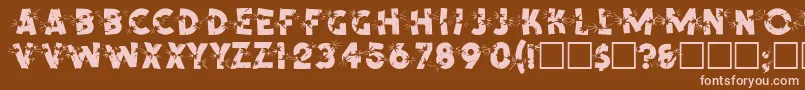 SpencerRegular-fontti – vaaleanpunaiset fontit ruskealla taustalla