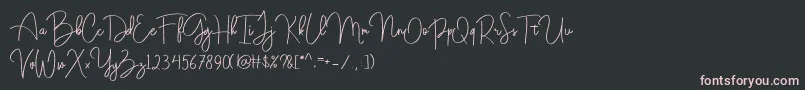 Czcionka DarkWell Demo – różowe czcionki na czarnym tle