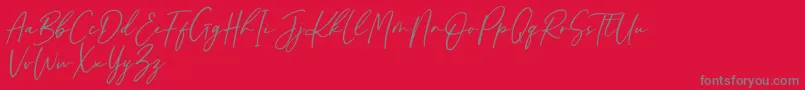 Darmogo Font – Gray Fonts on Red Background