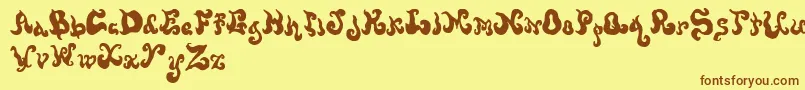 Czcionka Screwy – brązowe czcionki na żółtym tle