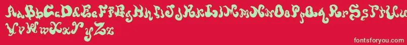 フォントScrewy – 赤い背景に緑の文字