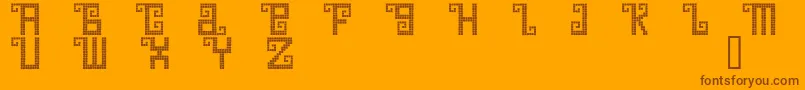 Quetd ffy-Schriftart – Braune Schriften auf orangefarbenem Hintergrund