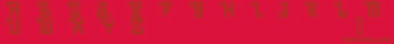 Quetd ffy-Schriftart – Braune Schriften auf rotem Hintergrund