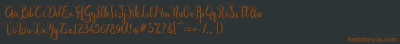 Dastan Script-fontti – ruskeat fontit mustalla taustalla