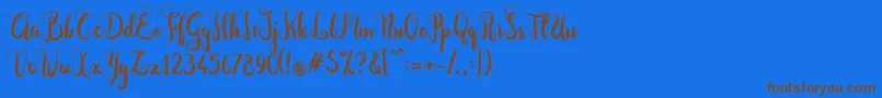 Dastan Script-Schriftart – Braune Schriften auf blauem Hintergrund