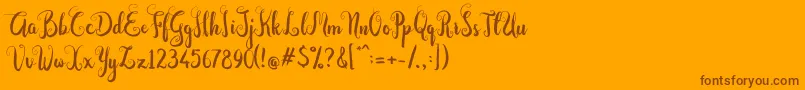 フォントDastan Script – オレンジの背景に茶色のフォント