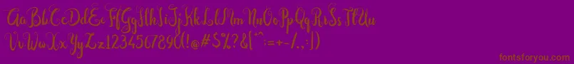 Dastan Script-fontti – ruskeat fontit violetilla taustalla