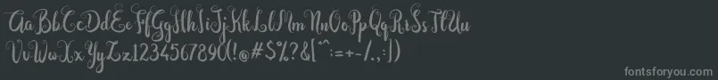 Шрифт Dastan Script – серые шрифты на чёрном фоне