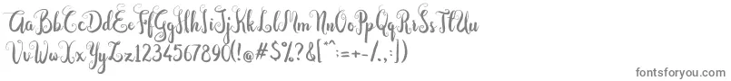 Dastan Script-fontti – harmaat kirjasimet valkoisella taustalla