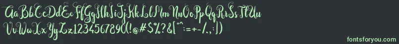 Dastan Script-fontti – vihreät fontit mustalla taustalla