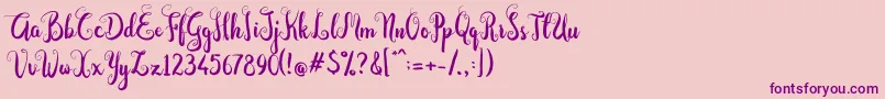 フォントDastan Script – ピンクの背景に紫のフォント