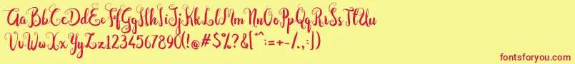Dastan Script-fontti – punaiset fontit keltaisella taustalla