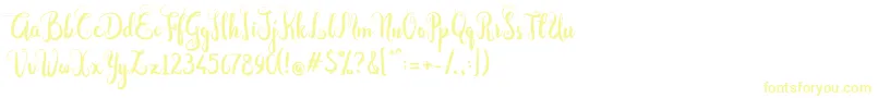 フォントDastan Script – 白い背景に黄色の文字