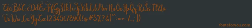 Dastan Script Font – Brown Fonts on Black Background