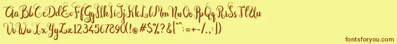 Dastan Script Font – Brown Fonts on Yellow Background