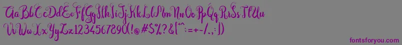 Dastan Script Font – Purple Fonts on Gray Background