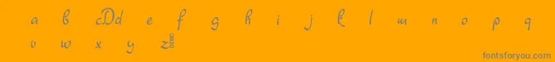 Dathyn Demo-Schriftart – Graue Schriften auf orangefarbenem Hintergrund