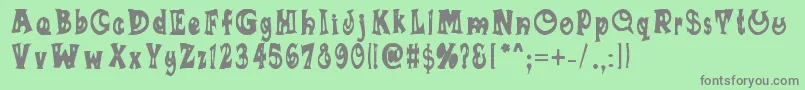 Sumananki Font – Gray Fonts on Green Background