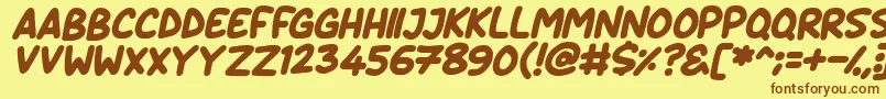 Fonte Daydreamers Italic – fontes marrons em um fundo amarelo