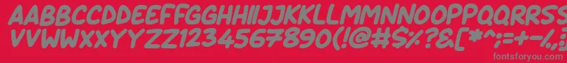 Fonte Daydreamers Italic – fontes cinzas em um fundo vermelho