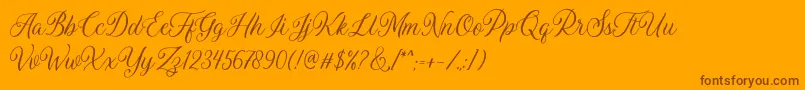 Daytonia Free-Schriftart – Braune Schriften auf orangefarbenem Hintergrund