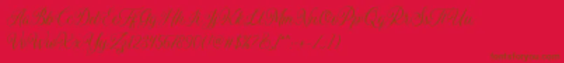 Czcionka Daytonia Free – brązowe czcionki na czerwonym tle