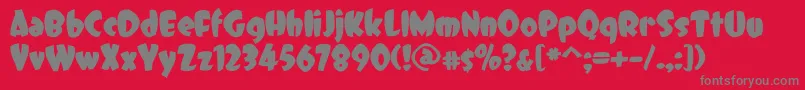 DCC   Dreamer-fontti – harmaat kirjasimet punaisella taustalla