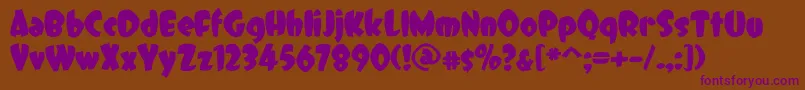 DCC   Dreamer-fontti – violetit fontit ruskealla taustalla