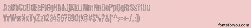 Шрифт DCC   Stained Aliens – чёрные шрифты на розовом фоне