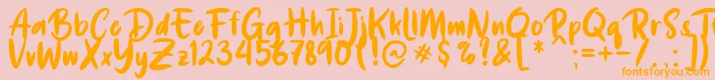 De Luxious Font – Orange Fonts on Pink Background