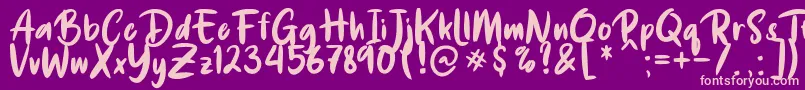 De Luxious Font – Pink Fonts on Purple Background