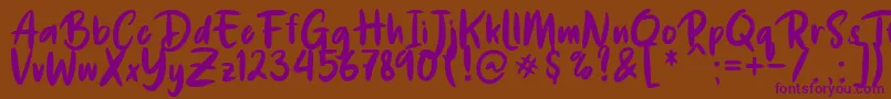 De Luxious Font – Purple Fonts on Brown Background