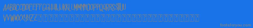 フォントDead solD – 青い背景に灰色の文字