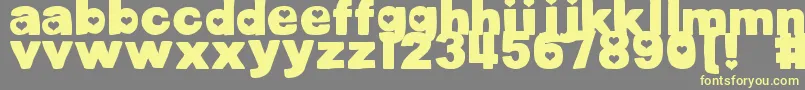 DjbCutoutsHearts-fontti – keltaiset fontit harmaalla taustalla