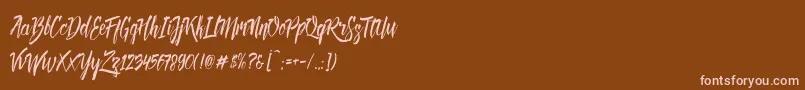 Deadhead Brush DEMO-Schriftart – Rosa Schriften auf braunem Hintergrund