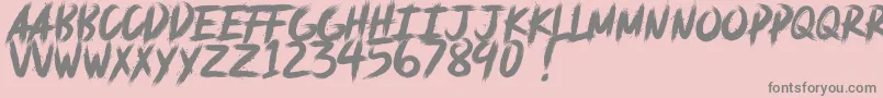 フォントdeadpack DEMO – ピンクの背景に灰色の文字