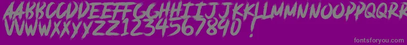 deadpack DEMO-fontti – harmaat kirjasimet violetilla taustalla