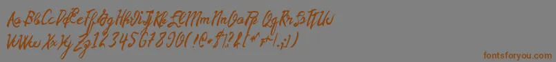 フォントDeadTasty – 茶色の文字が灰色の背景にあります。