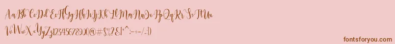 Dealove Script Demo-Schriftart – Braune Schriften auf rosa Hintergrund